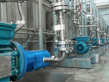 Industrial,Equipment.,Blue,Electric,Motors,With,Pumps,On,The,Stainless