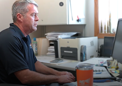Staff-Manager-in office-on computer